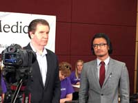 Dr. Navin Fernando filming KOMO 4 Healthworks segment